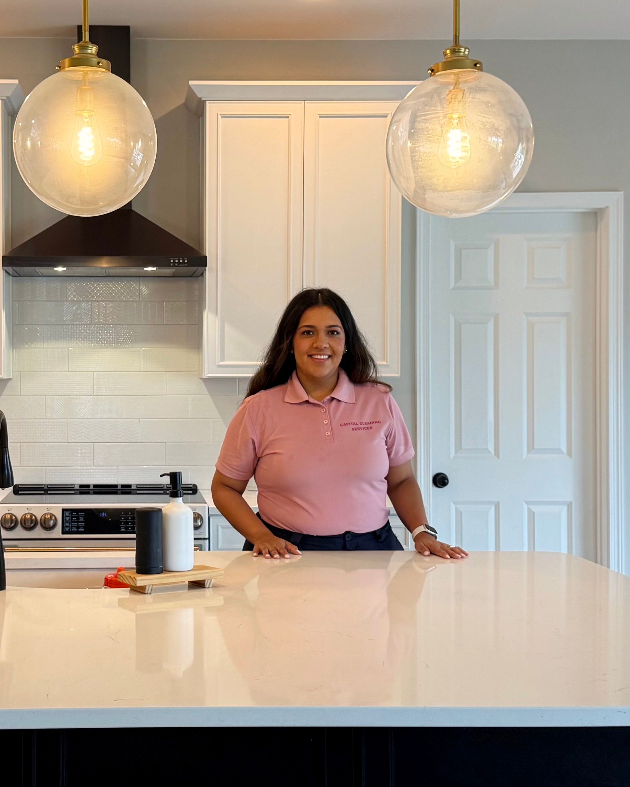 Veronica Navarro, owner of Capital Cleaning Services, in a freshly cleaned kitchen